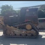 Un buldozer de la PNH incendié à Mariani